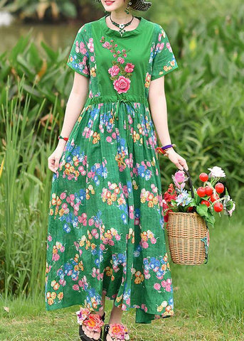 Vestido de verano francés de algodón con estampado verde y lazo en la cintura bordado. 