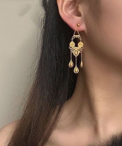 Pendientes colgantes con borlas doradas de moda 