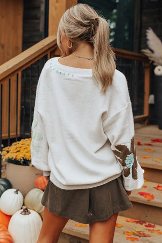 white floral v neck drop shoulder sweater