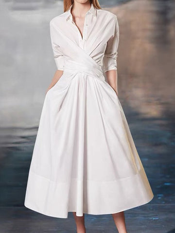 Elegante vestido midi de corte A con mangas largas, plisado y solapa en color liso 
