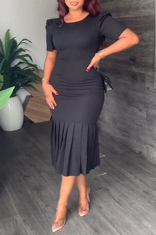 Vestido midi plisado de moda con cuello redondo, manga corta y falda a la cadera