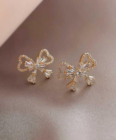 Pendientes de botón con lazo de circonita y aleación de plata esterlina y oro de moda 