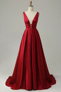 Langes, rotes A-Linien-Abendkleid mit tiefem V-Ausschnitt und rückenfreiem Design