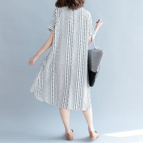 Vestido holgado informal de gasa con estampado floral blanco, holgado y de gran tamaño, con bolsillos y manga corta. 