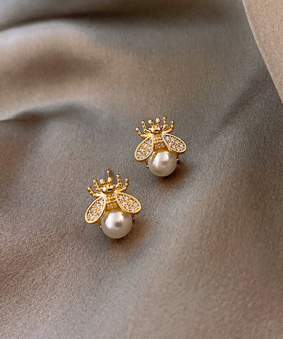 Pendientes Vogue con perla de abeja y cobre dorado 