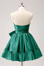 Vestido de fiesta corto fucsia con volantes y lazo, sin tirantes, corte en A