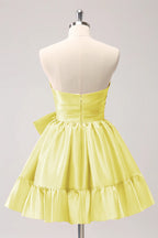 Vestido de fiesta corto fucsia con volantes y lazo, sin tirantes, corte en A