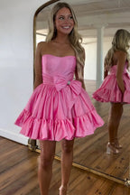 Vestido de fiesta corto fucsia con volantes y lazo, sin tirantes, corte en A
