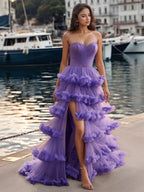 Vestido de fiesta con capas escalonadas, sin tirantes y con top de corsé plisado y transparente