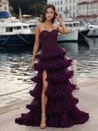 Vestido de fiesta con capas escalonadas, sin tirantes y con top de corsé plisado y transparente