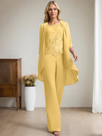Vestido de madre de la novia de gasa con encaje, escote redondo y lentejuelas y mono/pantalón separado 