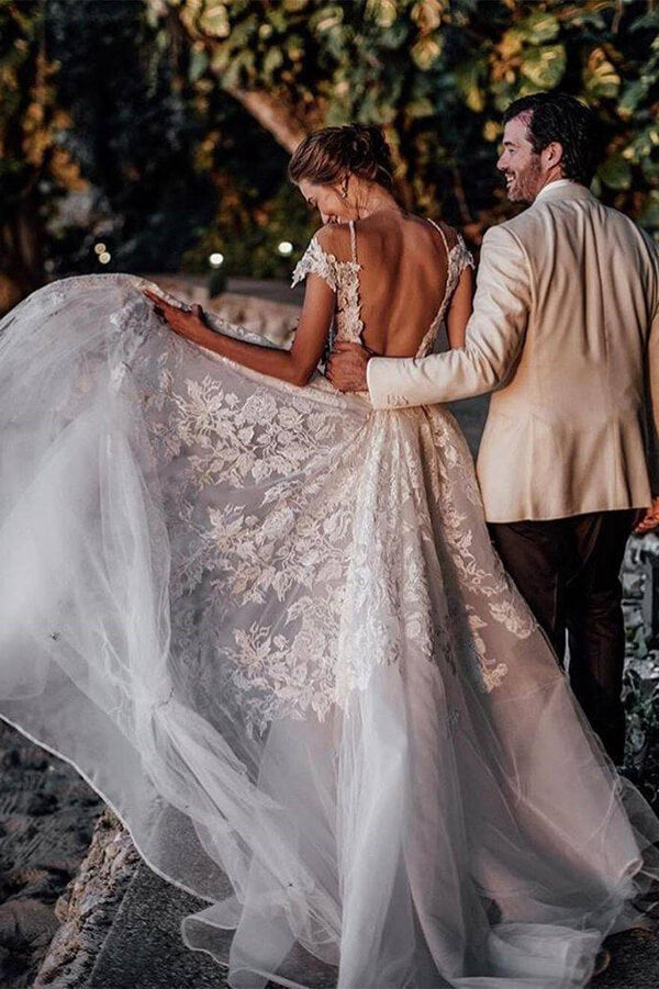 Wunderschöne Brautkleider aus Tüll im Meerjungfrauenstil mit kurzen Ärmeln und Spitzenapplikationen
