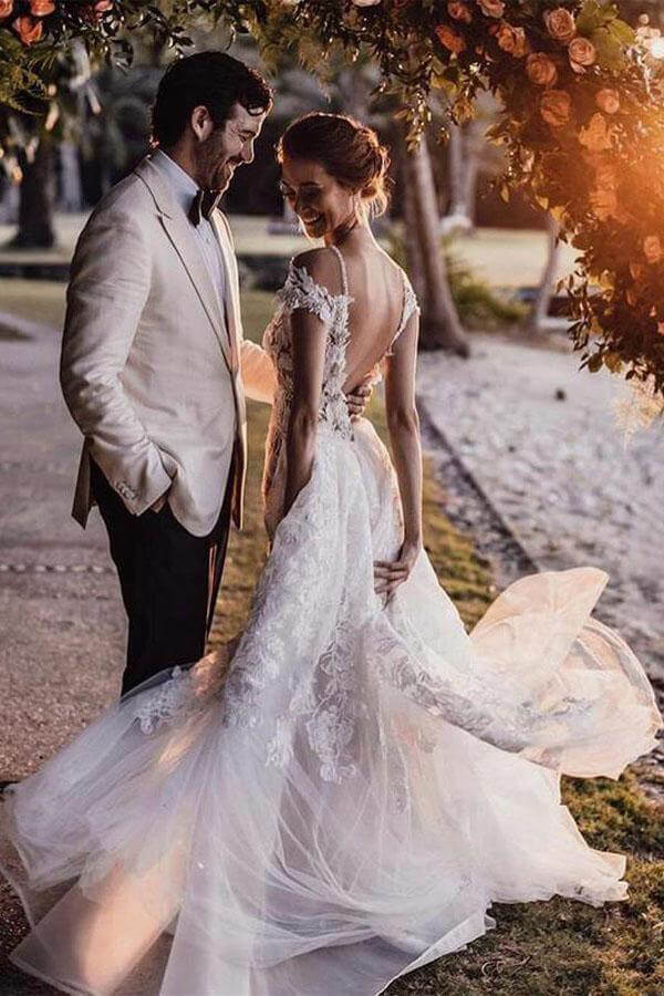 Wunderschöne Brautkleider aus Tüll im Meerjungfrauenstil mit kurzen Ärmeln und Spitzenapplikationen