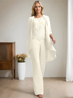 Vestido de madre de la novia de gasa con encaje, escote redondo y lentejuelas y mono/pantalón separado 