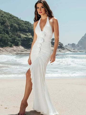 Vestido de vacaciones blanco con flores 3D y espalda descubierta