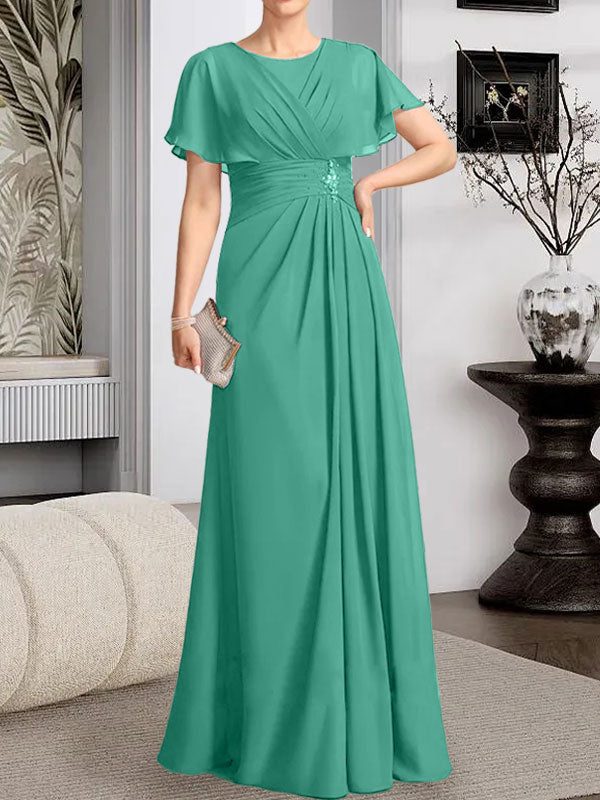 A-Linien-Kleid aus Chiffon mit Rundhalsausschnitt und bodenlanger Verarbeitung, verziert mit plissierten Perlen.