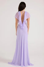 Vestidos de fiesta largos de gasa color lavanda con escote en V profundo, ribete de volantes y falda de sirena con lazo en la espalda para bailes de graduación y bodas en el jardín.