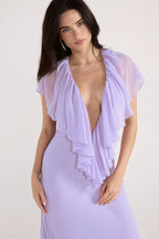 Vestidos de fiesta largos de gasa color lavanda con escote en V profundo, ribete de volantes y falda de sirena con lazo en la espalda para bailes de graduación y bodas en el jardín.