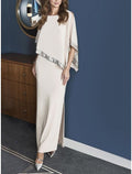 Vestidos para madre de la novia con escote joya, mangas 3/4 y largo hasta los tobillos. 