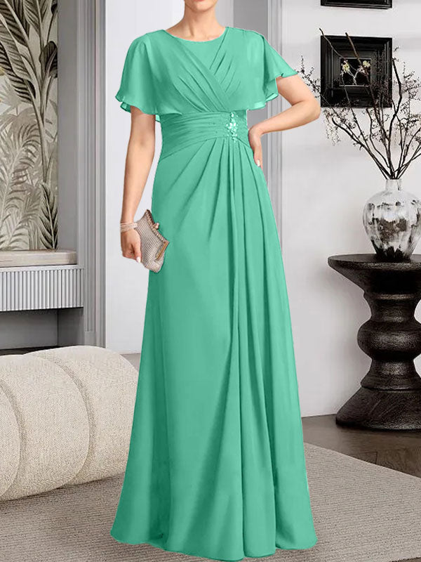 A-Linien-Kleid aus Chiffon mit Rundhalsausschnitt und bodenlanger Verarbeitung, verziert mit plissierten Perlen.