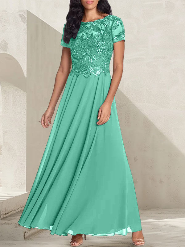 Anthrazitgraues, A-Linien-Kleid mit Rundhalsausschnitt und Perlenstickerei für die Mutter der Braut