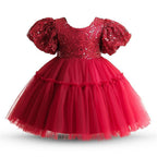 Vestido de primera comunión con panel de lentejuelas y malla para novia. 
