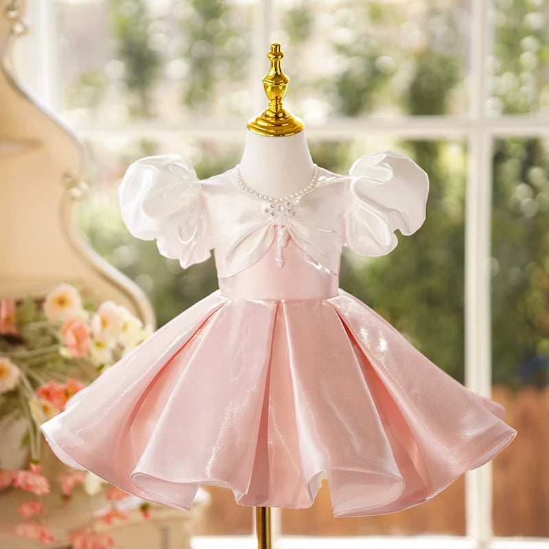 Niedliches rosa Blumenmädchenkleid mit Puffärmeln und Schleife für Babys und Kleinkinder, ideal für die Erstkommunion 