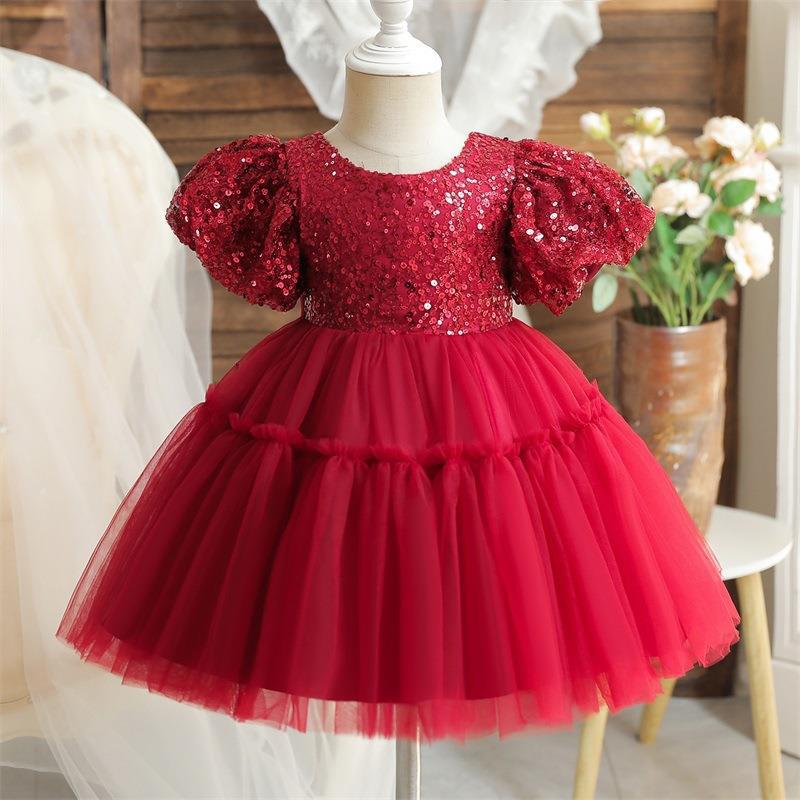Vestido de primera comunión con panel de lentejuelas y malla para novia. 
