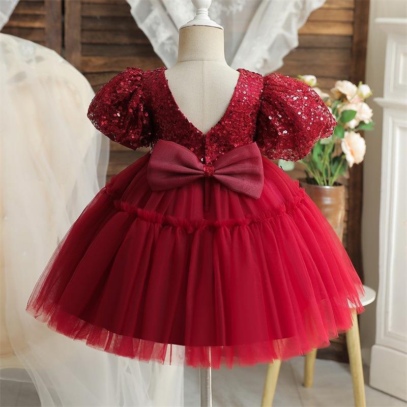 Vestido de primera comunión con panel de lentejuelas y malla para novia. 
