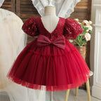 Vestido de primera comunión con panel de lentejuelas y malla para novia. 
