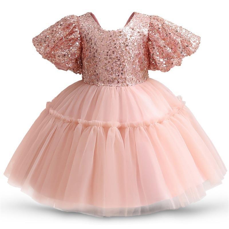 Vestido de primera comunión con panel de lentejuelas y malla para novia. 