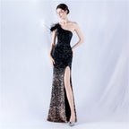 The new dress gradually changes the fleece bottom bead sheet process and orders the ostrich hair single shoulder oblique collar high fork evening dress