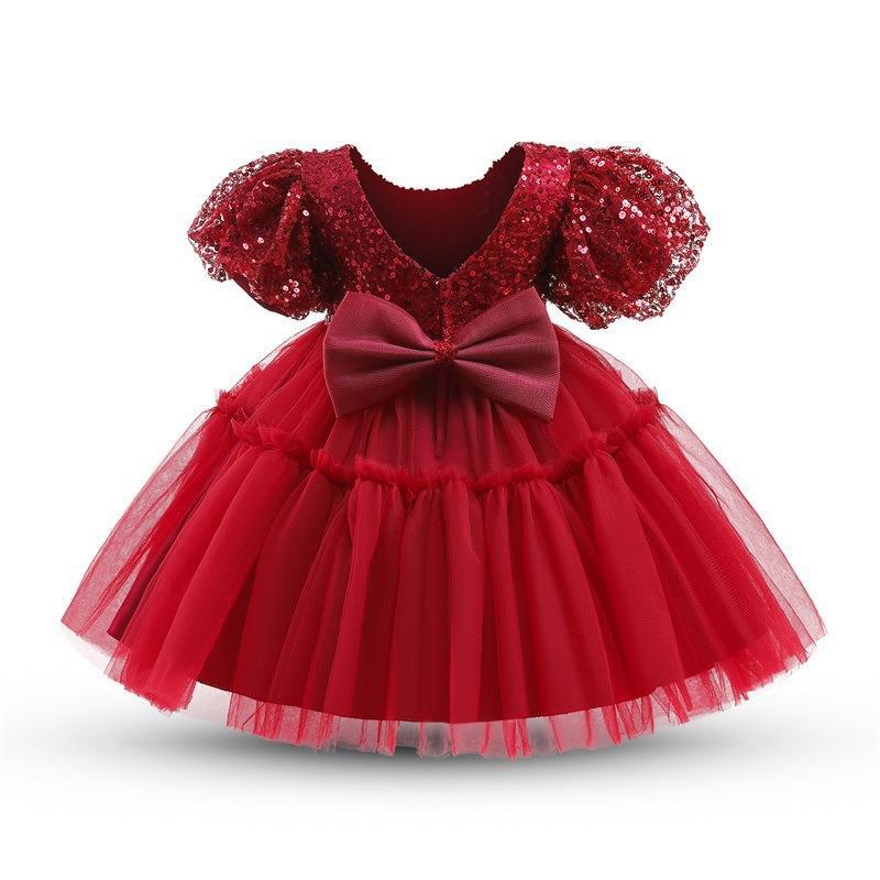 Vestido de primera comunión con panel de lentejuelas y malla para novia. 