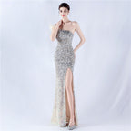 The new dress gradually changes the fleece bottom bead sheet process and orders the ostrich hair single shoulder oblique collar high fork evening dress