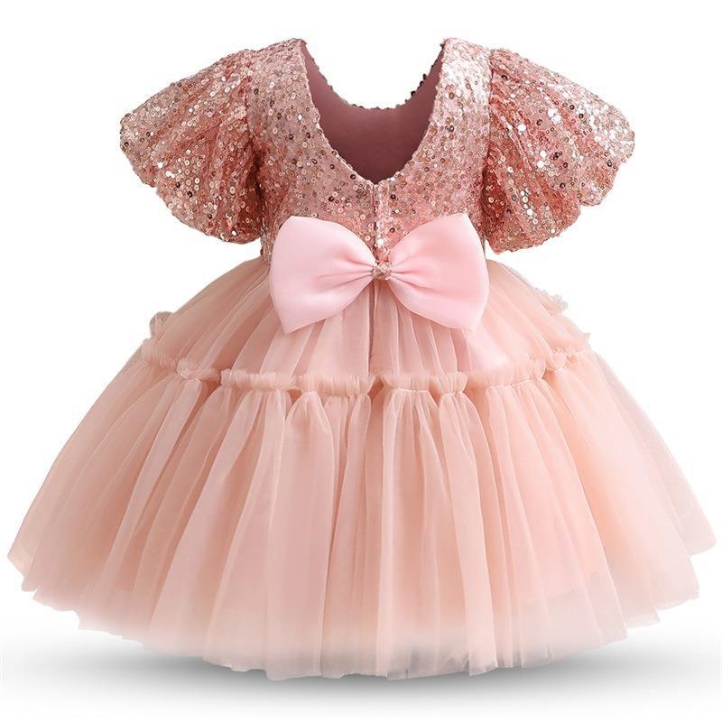 Vestido de primera comunión con panel de lentejuelas y malla para novia. 