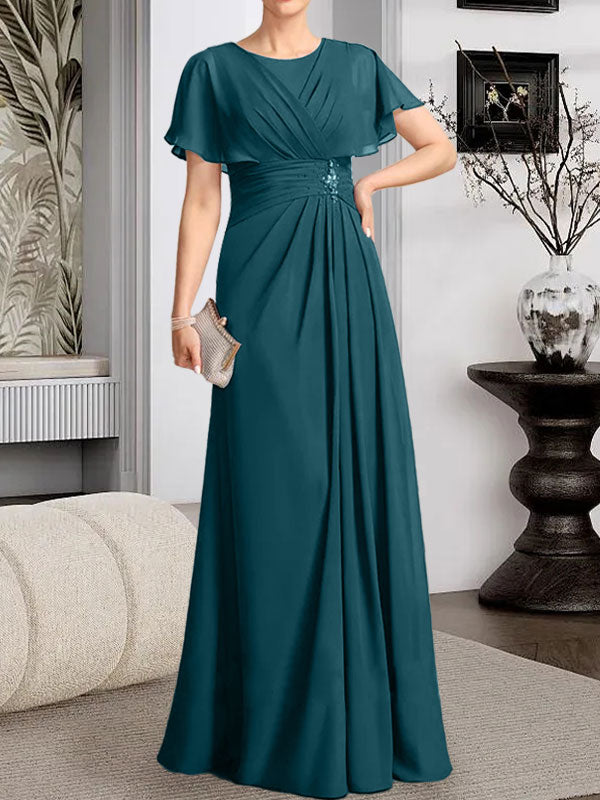 A-Linien-Kleid aus Chiffon mit Rundhalsausschnitt und bodenlanger Verarbeitung, verziert mit plissierten Perlen.
