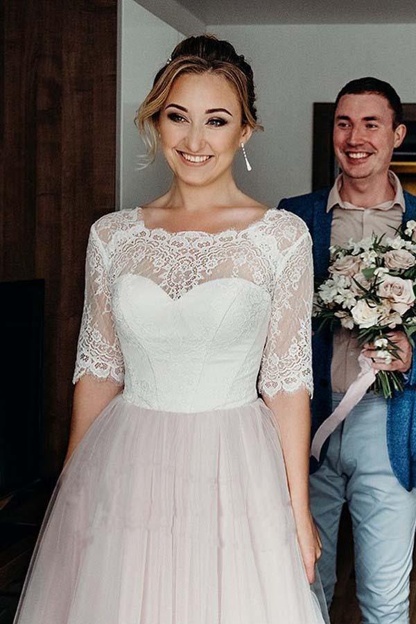Rosa Brautkleid aus Tüllspitze mit rückenfreiem Rücken, halben Ärmeln und Schnürung