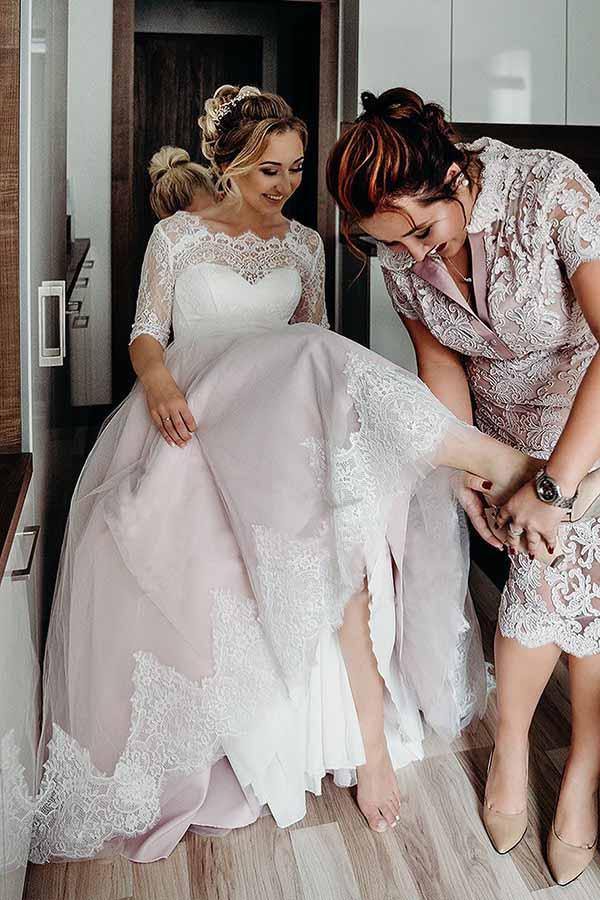 Rosa Brautkleid aus Tüllspitze mit rückenfreiem Rücken, halben Ärmeln und Schnürung