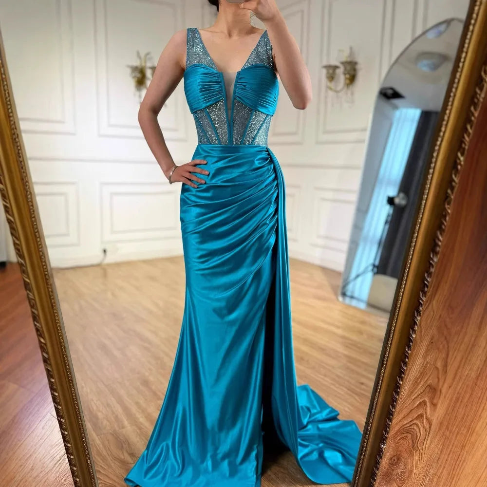 Blaues Ballkleid mit seitlichem Überrock und Spaghettiträgern LA73011