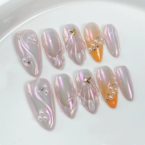 10 uñas postizas Aurora con diseño de conchas 3D, diseño de estrellas Y2K, color naranja degradado y almendra, manicura hecha a mano. 