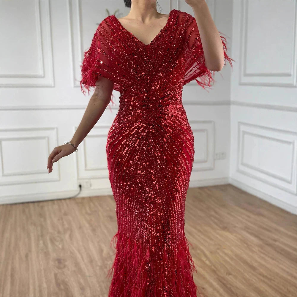 Luxuriöses arabisches rotes Meerjungfrauen-Abendkleid mit Federn und Perlenbesatz LA71323A
