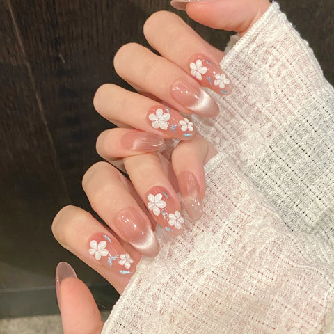 10 uñas postizas de flores blancas pintadas a mano, brillantes, color rosa almendra, estilo ojo de gato, desmontables, estilo primaveral. 