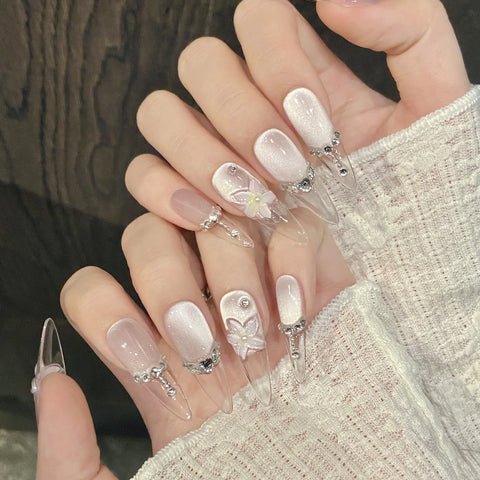 10 uñas postizas 3D con diseño de flor de hielo transparente, con purpurina y diamantes de imitación, color morado claro, estilo ojo de gato francés, hechas a mano. 