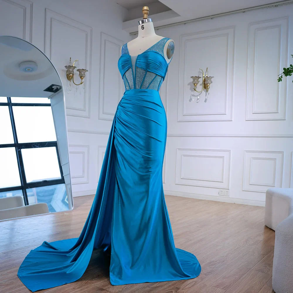 Blaues Ballkleid mit seitlichem Überrock und Spaghettiträgern LA73011