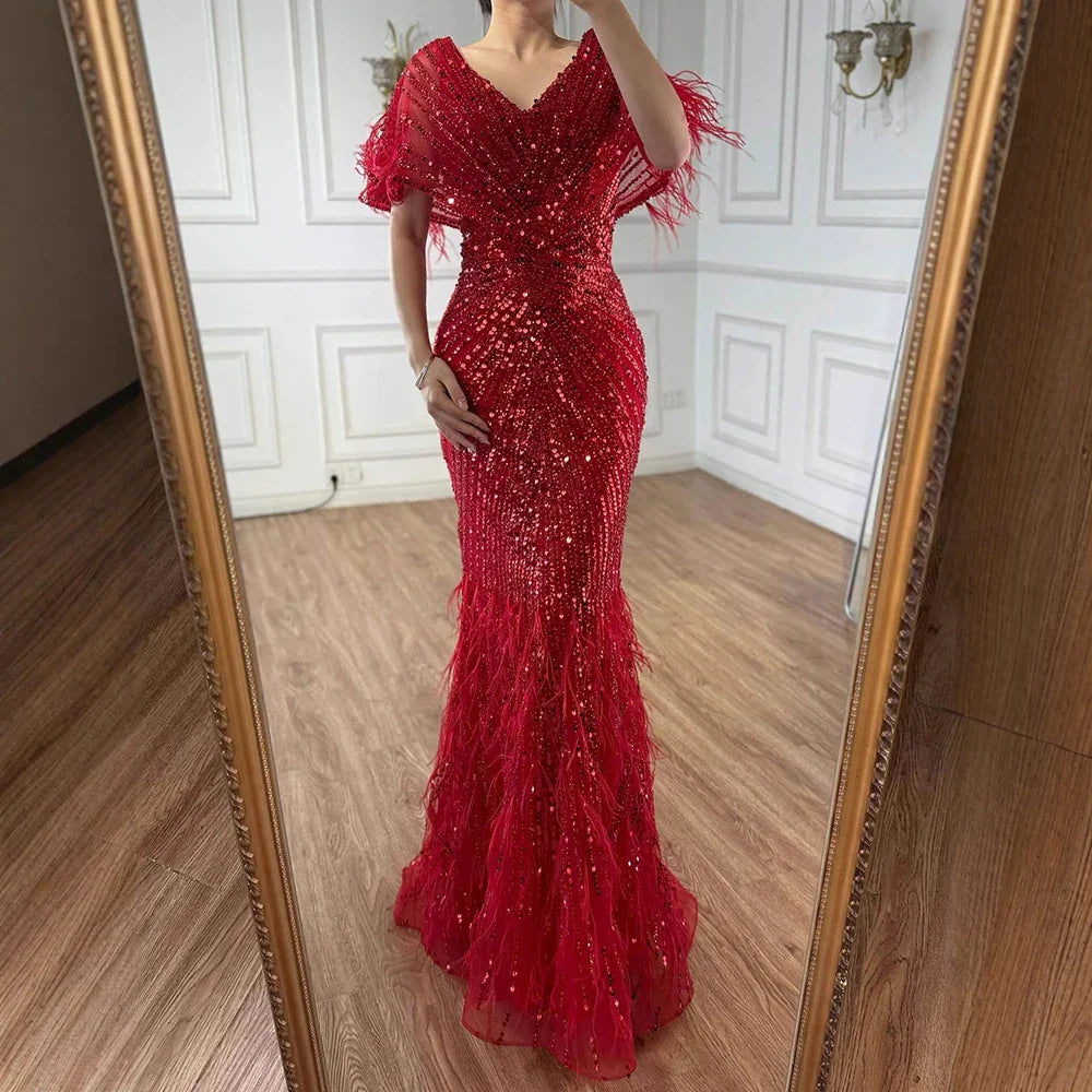 Luxuriöses arabisches rotes Meerjungfrauen-Abendkleid mit Federn und Perlenbesatz LA71323A