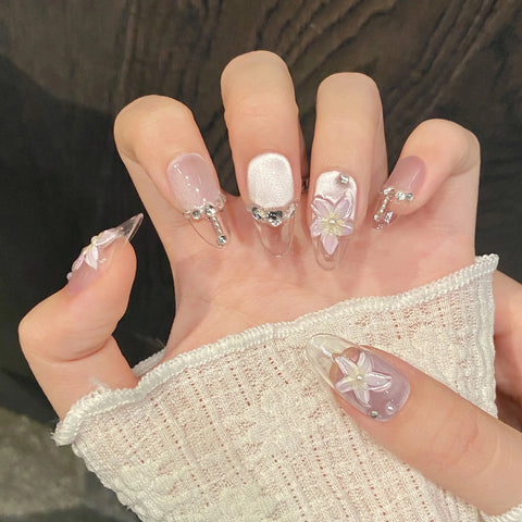10 uñas postizas 3D con diseño de flor de hielo transparente, con purpurina y diamantes de imitación, color morado claro, estilo ojo de gato francés, hechas a mano. 