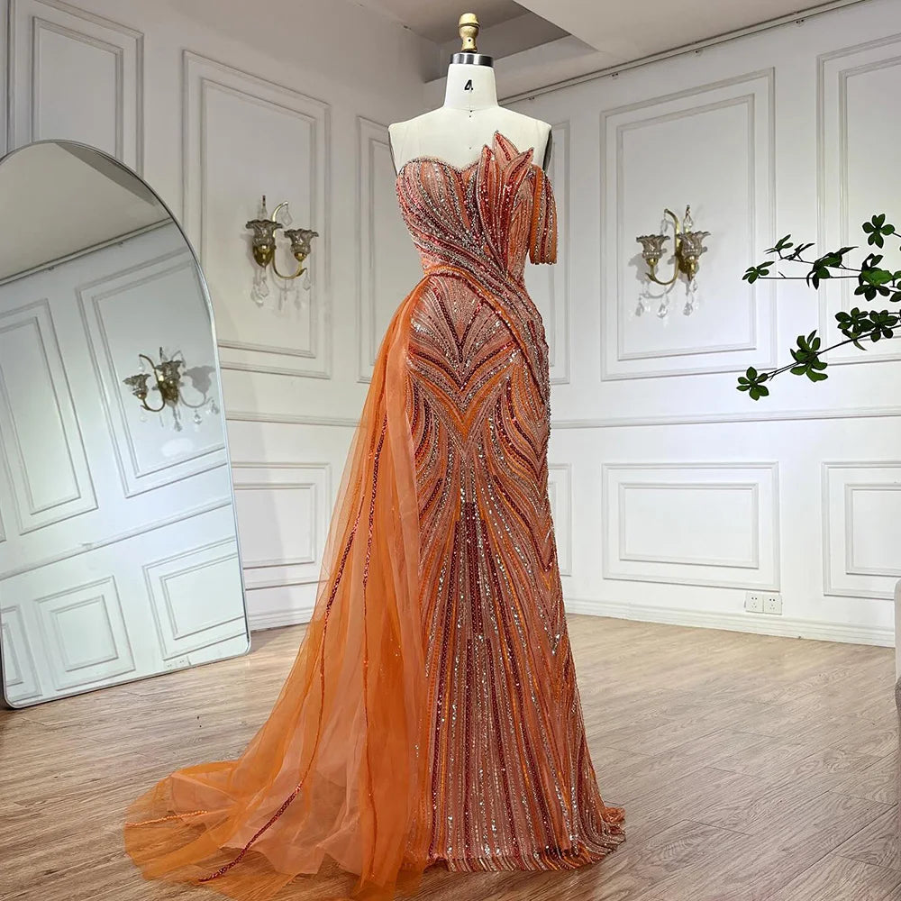 Luxuriöses, arabisch-blaues Abendkleid aus Dubai mit asymmetrischem Rock, seitlichem Überrock und Perlenbesatz für Damenpartys LA72662 