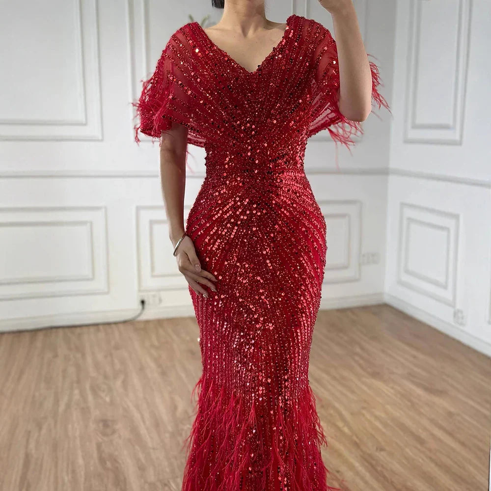 Luxuriöses arabisches rotes Meerjungfrauen-Abendkleid mit Federn und Perlenbesatz LA71323A