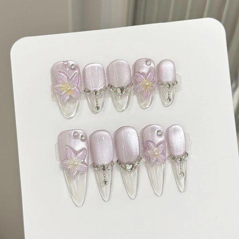 10 uñas postizas 3D con diseño de flor de hielo transparente, con purpurina y diamantes de imitación, color morado claro, estilo ojo de gato francés, hechas a mano. 