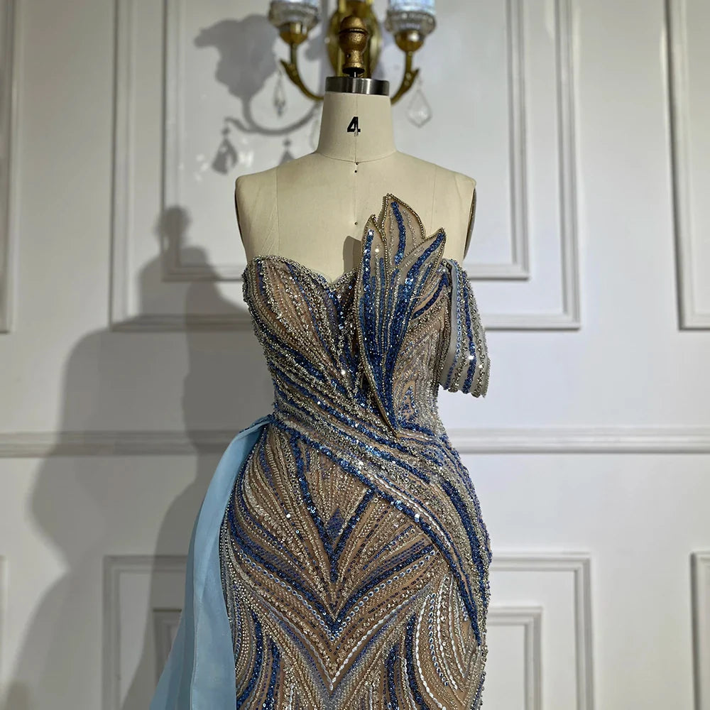 Luxuriöses, arabisch-blaues Abendkleid aus Dubai mit asymmetrischem Rock, seitlichem Überrock und Perlenbesatz für Damenpartys LA72662 